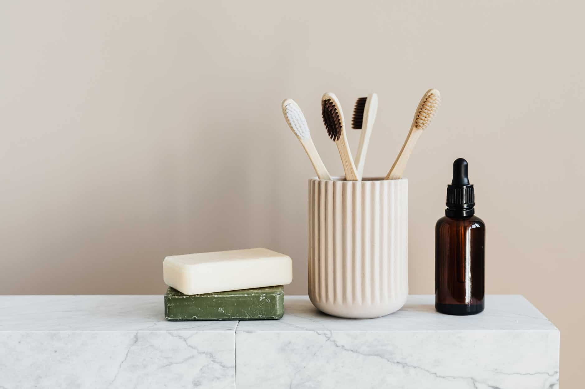 set of natural nonpolluting toiletries on marble table