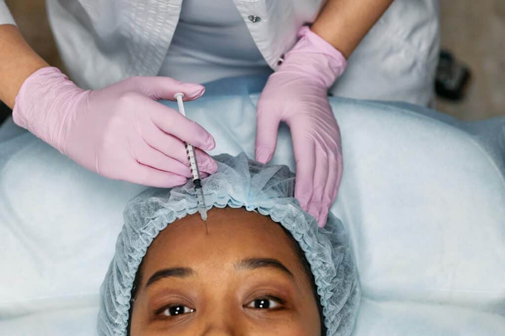 woman getting a forehead botox