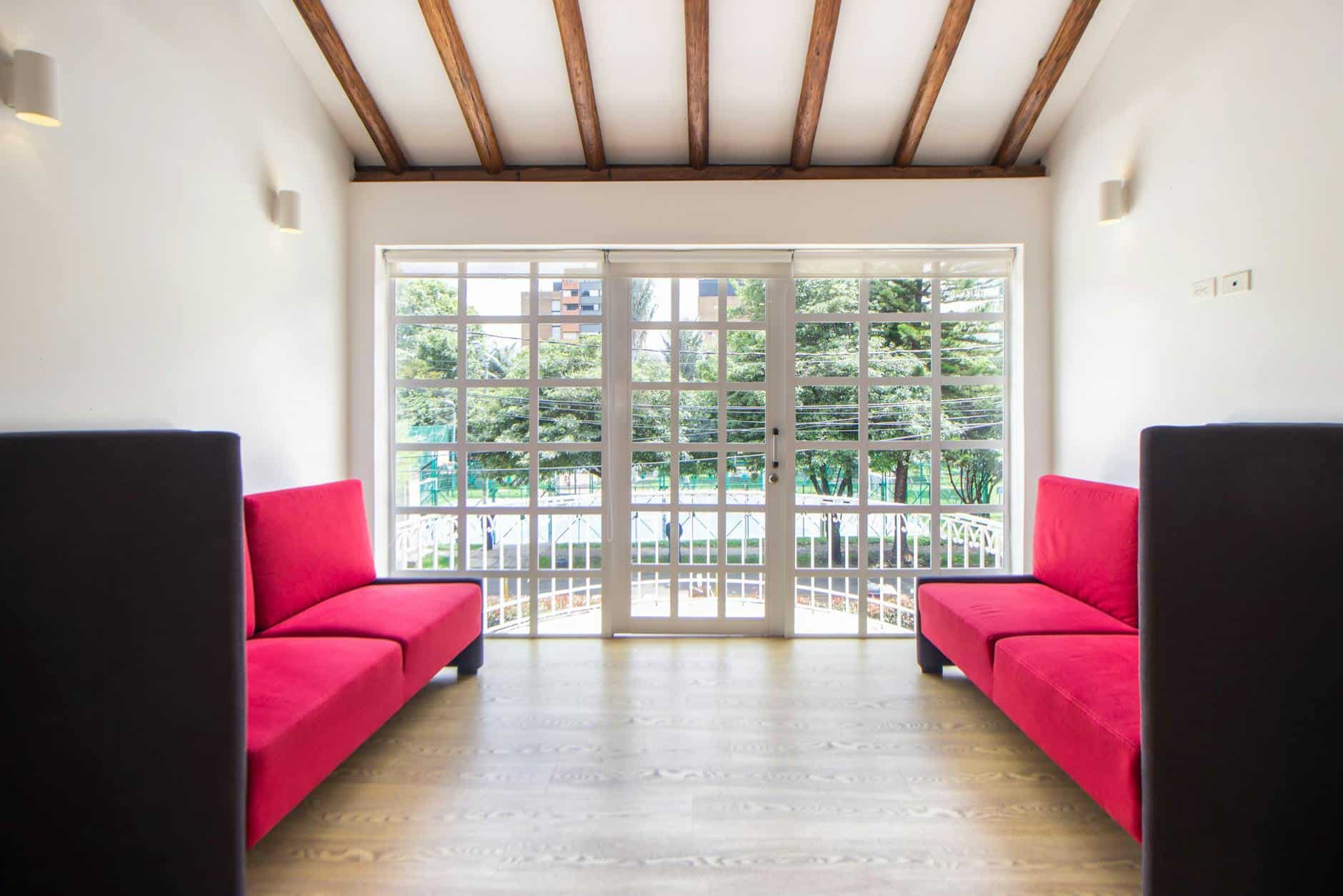 red sofa in the living room with wooden flooring French door cost