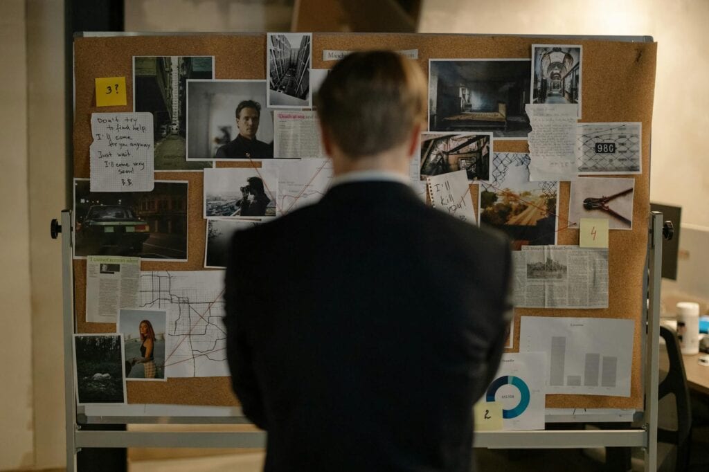 back view of woman looking at the bulletin board